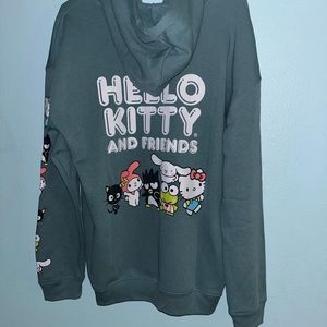The size is XL and it is a light green zip up.